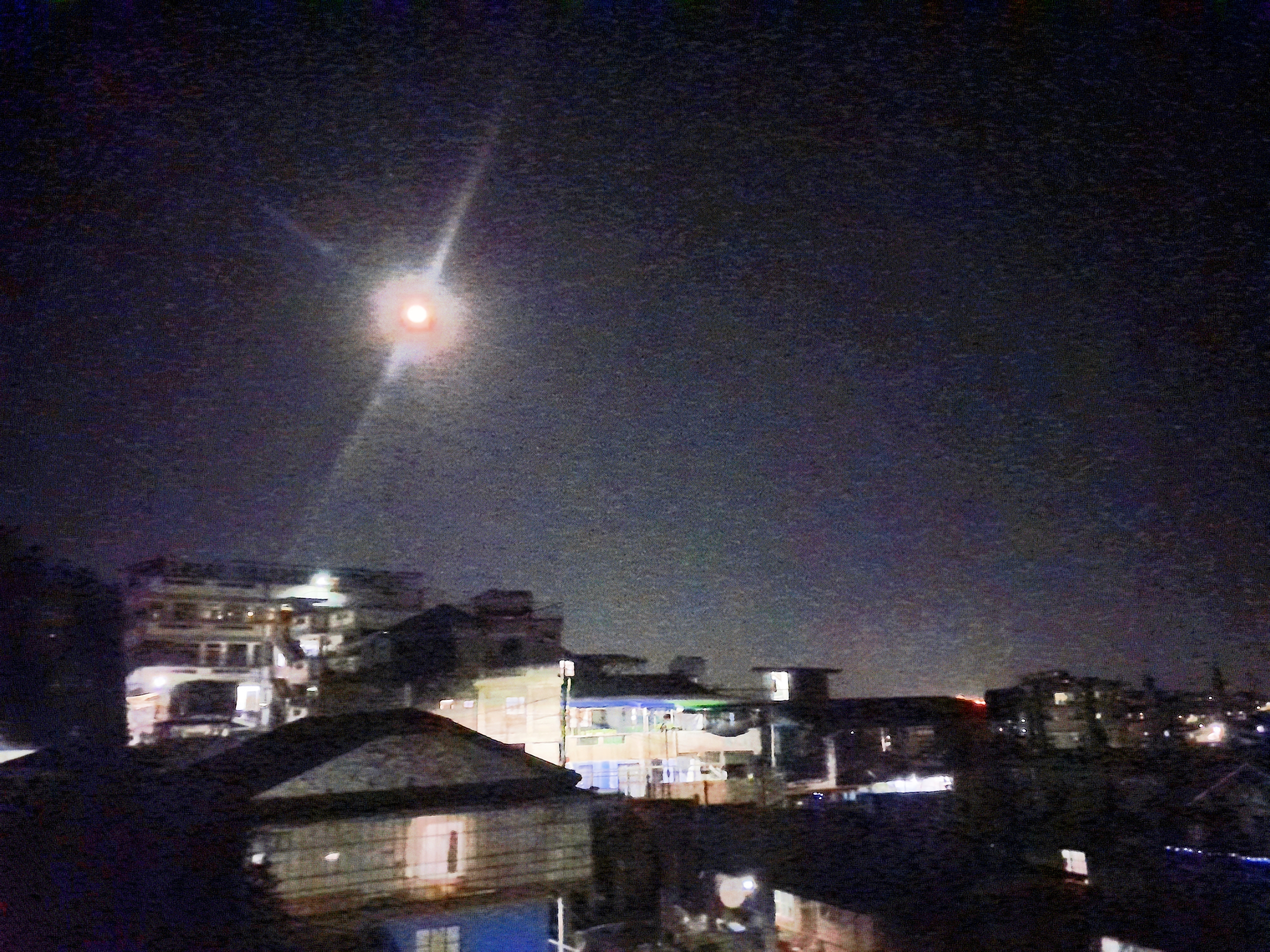 a low-quality photo of a clear night sky.